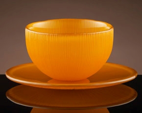 Firefly Tea Bowl & Saucer in Orange